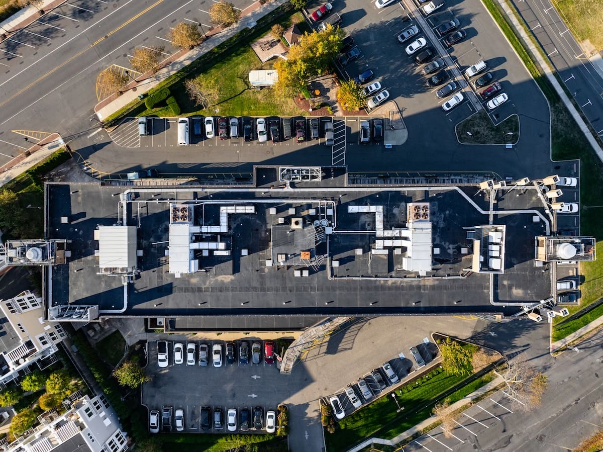 Apartment complex rooftop from an aerial view