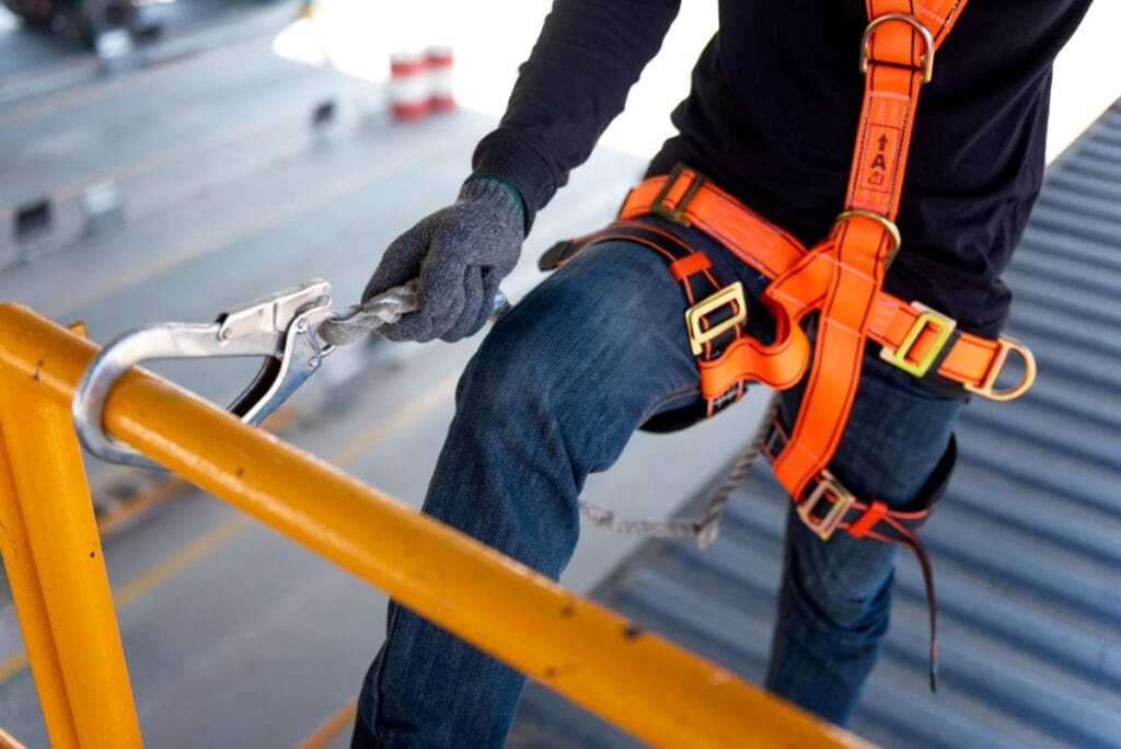 abc step safety award worker using orange harness
