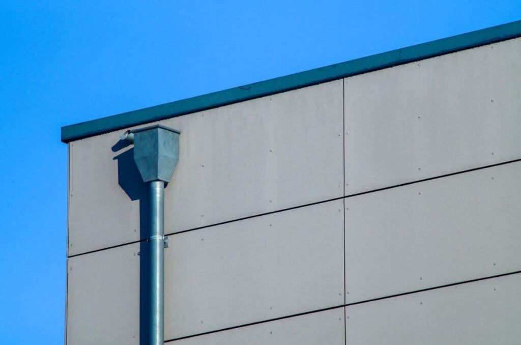 roof scupper flat roof grey wall