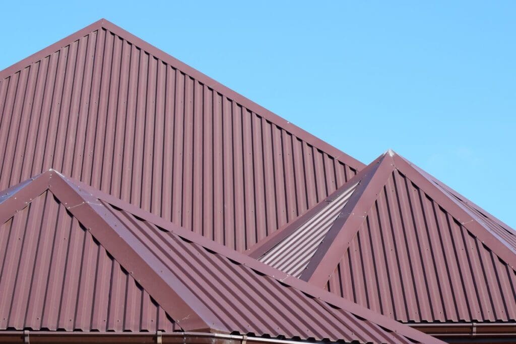 how to repair metal roof brown corrugated metallic roof blue sky