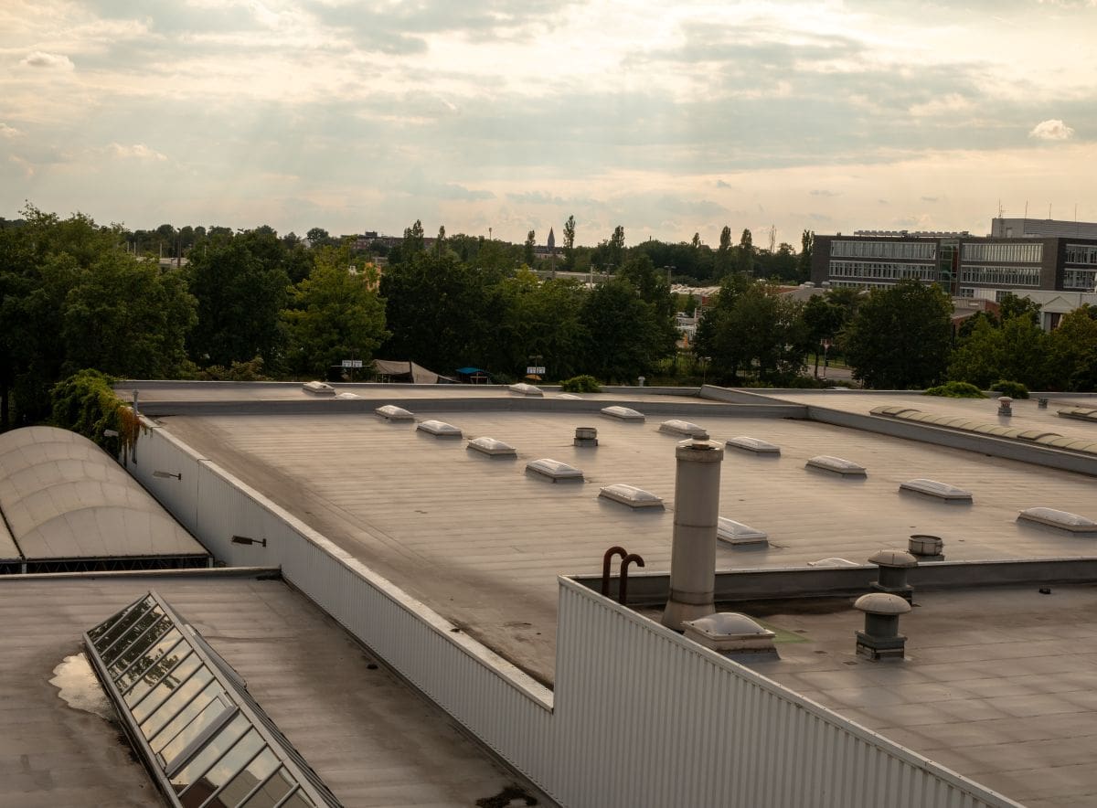 asphalt flat roof repair HVAC on top of commercial building