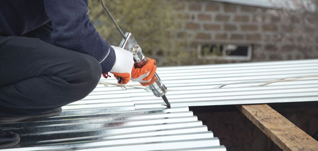 best metal roof sealant worker using white gloves applying sealant