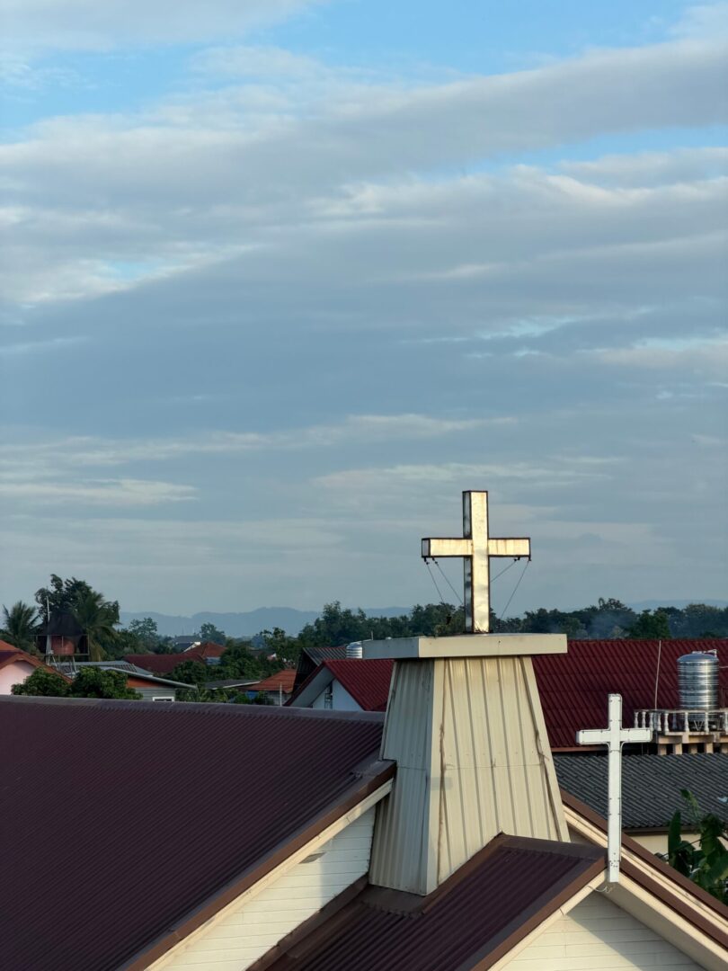 red roof white cross