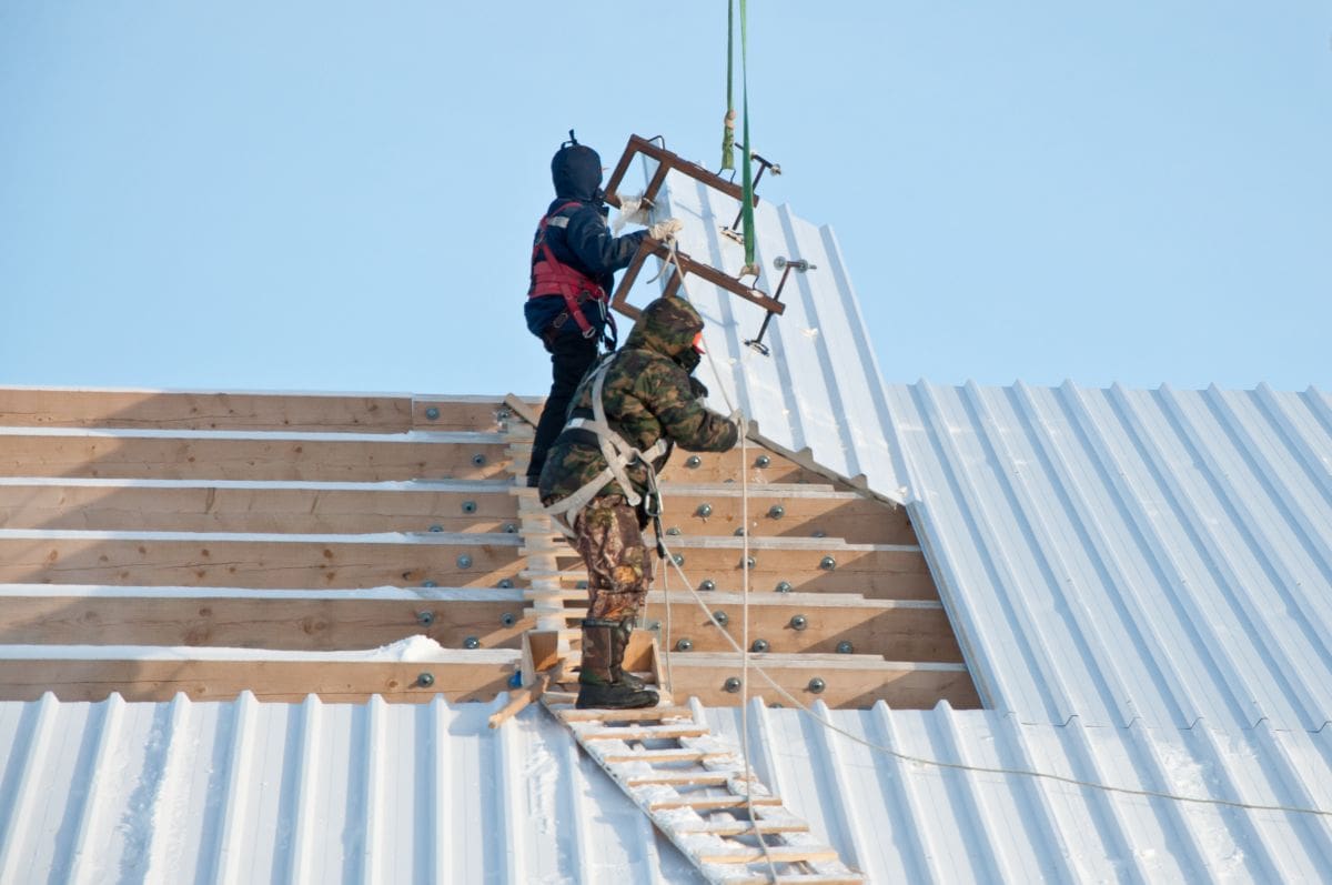 guys installing white metal roof